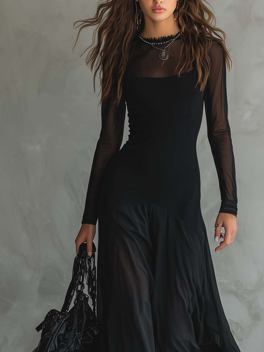 Vestido largo holgado de tul negro.