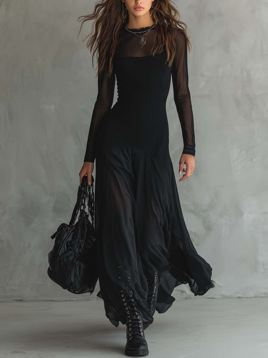 Vestido largo holgado de tul negro.
