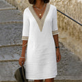 Elise – Elegante vestido de manga tres cuartos con escote en V.