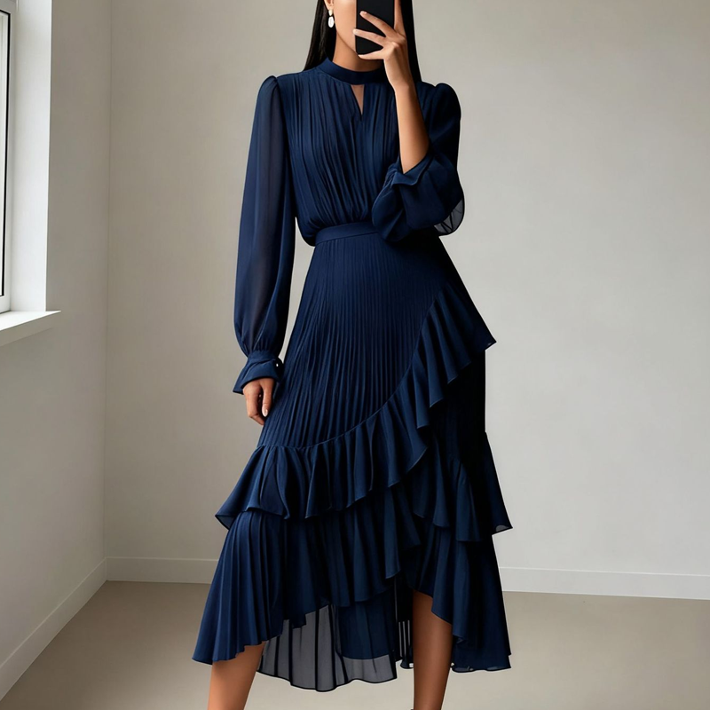Élégante robe midi plissée à volants.